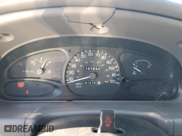 1999 Ford Escort LX с VIN 1FAFP10P5XW277376, выставлен на аукционе Copart как лот 82148204 с пробегом 127 634 миль миль и Списание • Salvage title. История ставок и продаж доступна на DreamBid. Изображение 9.