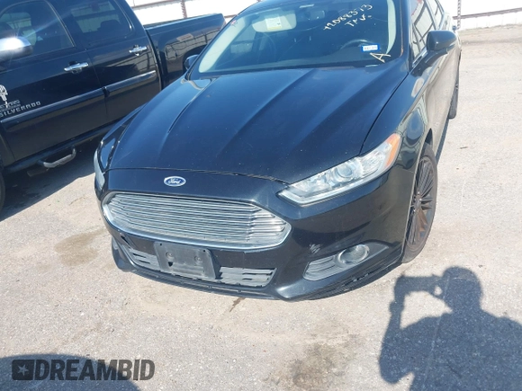2014 Ford Fusion SE with VIN 3FA6P0HD4ER390773, listed as a IAAI auction lot 42088373 with 265,001 mi miles and . Bid and sale history available at DreamBid. Image 6.