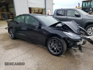 2022 Tesla Model 3 with VIN 5YJ3E1EA6NF188263, listed as a Copart auction lot 77542203 with 75,461 mi miles and Non Repairable. Bid and sale history available at DreamBid. Image 4.