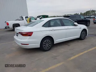 2019 Volkswagen Jetta SEL z VIN 3VWE57BU4KM248989, wystawiony jako IAAI lot #41465186 z przebiegiem 41 985 mil mil oraz . Historia ofert i sprzedaży dostępna na DreamBid. Obrazek 4.