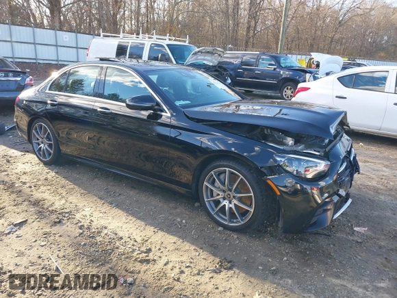 2021 Mercedes-Benz E-Class E 450 with VIN W1KZF5KB8MB002449, listed as a IAAI auction lot 41224307 with 57,093 mi miles. Bid and sale history available at carsss.com. Image 1.