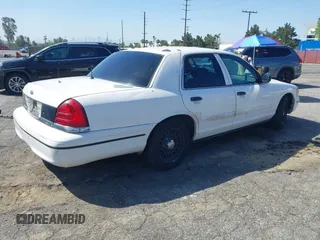1999 Ford Crown Victoria Police с VIN 2FAFP71W1XX200937, выставлен на аукционе IAAI как лот 41977836 с пробегом 186 379 миль миль и . История ставок и продаж доступна на DreamBid. Изображение 4.