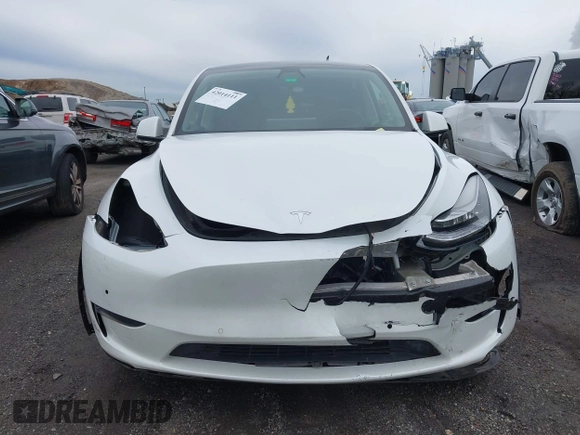 2022 Tesla Model Y Long Range z VIN 7SAYGDEE7NF389788, wystawiony jako IAAI lot #42014111 z przebiegiem 37 606 mil mil oraz . Historia ofert i sprzedaży dostępna na DreamBid. Obrazek 11.