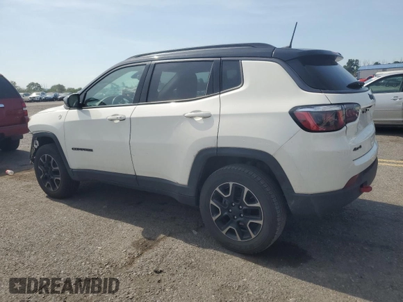 2019 Jeep Compass Trailhawk with VIN 3C4NJDDB5KT647778, listed as a Copart auction lot 62032515 with 51,505 mi miles and Salvage title. Bid and sale history available at DreamBid. Image 2.