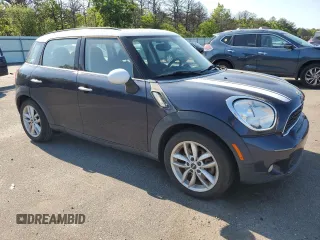 2013 MINI Countryman S with VIN WMWZC3C56DWP23892, listed as a Copart auction lot 58837985 with 98,988 mi miles and Clean title. Bid and sale history available at DreamBid. Image 4.