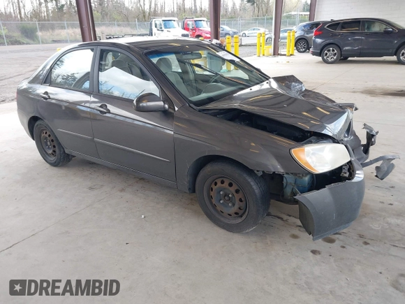 2004 Kia Spectra LX with VIN KNAFE121145031237, listed as a IAAI auction lot 41954550 with 133,744 mi miles. Bid and sale history available at carsss.com. Image 1.