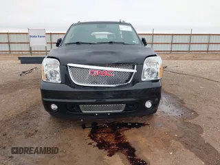 2014 GMC Yukon XL Denali with VIN 1GKS2MEF8ER239777, listed as a IAAI auction lot 41192009 with 142,656 mi miles. Bid and sale history available at carsss.com. Image 13.