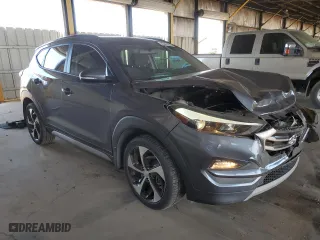 2018 Hyundai Tucson Value with VIN KM8J33A23JU823248, listed as a Copart auction lot 42967005 with 107,295 mi miles and Salvage Title. Bid and sale history available at carsss.com. Image 4.