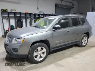 2012 Jeep Compass Sport with VIN 1C4NJCBB4CD579381, listed as a Copart auction lot 87043604 with 87,667 mi miles and Clean Title. Bid and sale history available at carsss.com. Image 1.