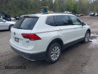 2018 Volkswagen Tiguan SEL z VIN 3VV2B7AX5JM164450, wystawiony jako IAAI lot #42191718 z przebiegiem 68 556 mil mil oraz . Historia ofert i sprzedaży dostępna na DreamBid. Obrazek 4.