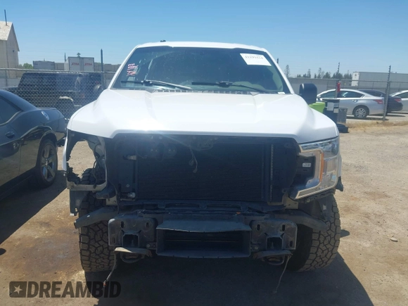 2018 Ford F-150 XL with VIN 1FTEW1EP8JKF82063, listed as a IAAI auction lot 42299414 with 153,706 mi miles and . Bid and sale history available at DreamBid. Image 13.