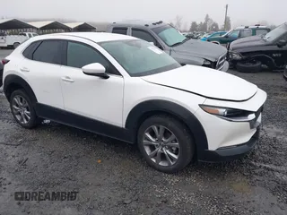 2021 Mazda CX-30 Select with VIN 3MVDMBBL3MM205256, listed as a IAAI auction lot 41302313 with 17,709 mi miles and . Bid and sale history available at DreamBid. Image 1.