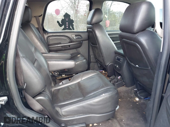 2012 GMC Yukon Denali with VIN 1GKS2EEF8CR320121, listed as a IAAI auction lot 41976562 with 157,050 mi miles. Bid and sale history available at carsss.com. Image 8.