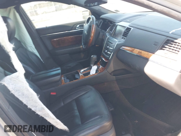 2013 Lincoln MKS EcoBoost with VIN 1LNHL9FT9DG613100, listed as a IAAI auction lot 41614096 with 207,789 mi miles. Bid and sale history available at carsss.com. Image 5.