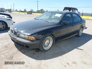 2000 BMW 5 Series 528i with VIN WBADM6349YGU29547, listed as a IAAI auction lot 42138468 with 207,469 mi miles and . Bid and sale history available at DreamBid. Image 2.