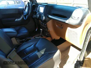2015 Jeep Wrangler Unlimited Sahara with VIN 1C4BJWEG0FL568237, listed as a IAAI auction lot 41697726 with 82,751 mi miles. Bid and sale history available at carsss.com. Image 5.