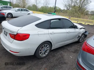 2014 BMW 3 Series GT 328i xDrive with VIN WBA3X5C5XED559713, listed as a IAAI auction lot 42078622 with 68,233 mi miles. Bid and sale history available at carsss.com. Image 13.