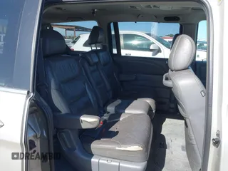 2005 Honda Odyssey EX-L with VIN 5FNRL38705B008884, listed as a IAAI auction lot 42081384 with 219,336 mi miles. Bid and sale history available at carsss.com. Image 8.