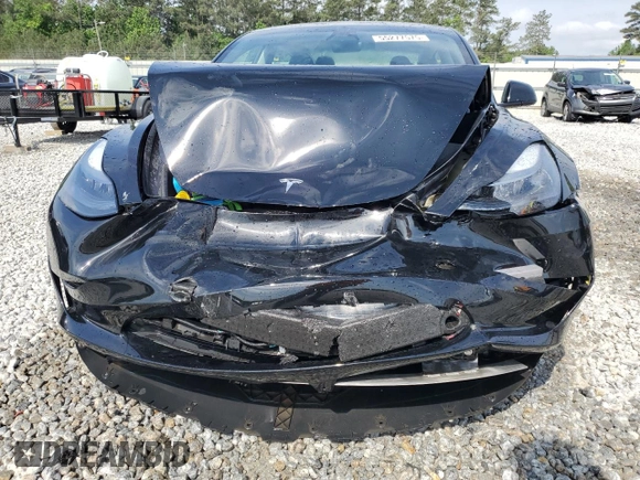 2023 Tesla Model 3 z VIN 5YJ3E1EA4PF559424, wystawiony jako Copart lot #55277575 z przebiegiem 59 886 mil mil oraz Szkoda całkowita • Salvage title. Historia ofert i sprzedaży dostępna na DreamBid. Obrazek 5.