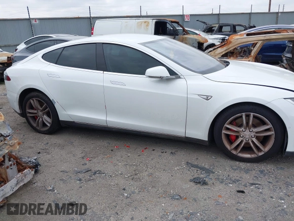 2016 Tesla Model S 90D with VIN 5YJSA1E40GF123543, listed as a IAAI auction lot 42111603 with 126,445 mi miles and . Bid and sale history available at DreamBid. Image 12.