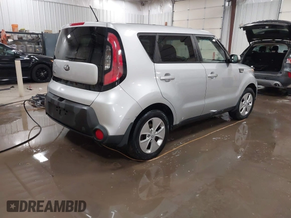 2014 Kia Soul with VIN KNDJN2A21E7701162, listed as a IAAI auction lot 41386456 with 111,992 mi miles. Bid and sale history available at carsss.com. Image 4.