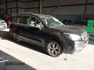 2017 Subaru Forester Touring z VIN JF2SJAWC8HH470269, wystawiony jako IAAI lot #41950347 z przebiegiem 135 189 mil mil oraz . Historia ofert i sprzedaży dostępna na DreamBid. Obrazek 1.