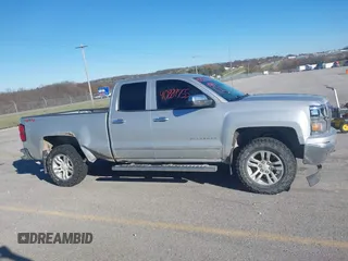 2014 Chevrolet Silverado 1500 LT with VIN 1GCVKREC1EZ134204, listed as a IAAI auction lot 40889755 with 174,575 mi miles and . Bid and sale history available at DreamBid. Image 14.