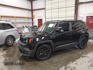 2018 Jeep Renegade Latitude with VIN ZACCJABB8JPJ22452, listed as a IAAI auction lot 42419654 with 60,086 mi miles and . Bid and sale history available at DreamBid. Image 2.