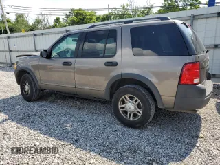 2003 Ford Explorer XLS with VIN 1FMZU72K43UB12036, listed as a Copart auction lot 61124985 with 210,901 mi miles and Salvage title. Bid and sale history available at DreamBid. Image 2.