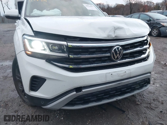 2022 Volkswagen Atlas SE z VIN 1V2KR2CA1NC555087, wystawiony jako IAAI lot #40921013 z przebiegiem 62 834 mil mil oraz . Historia ofert i sprzedaży dostępna na DreamBid. Obrazek 18.