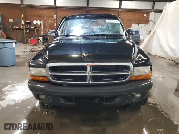 2004 Dodge Dakota Sport z VIN 1D7HG38KX4S782636, wystawiony jako Copart lot #88805195 z przebiegiem 151 620 mil mil oraz Szkoda całkowita • Salvage title. Historia ofert i sprzedaży dostępna na DreamBid. Obrazek 5.