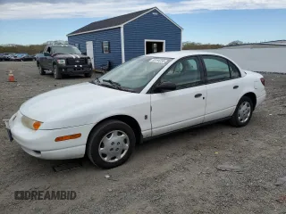 2002 Saturn SL z VIN 1G8ZH52842Z303274, wystawiony jako Copart lot #55164235 z przebiegiem 123 177 mil mil oraz Tytuł czysty. Historia ofert i sprzedaży dostępna na DreamBid. Obrazek 1.