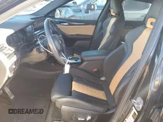 2023 BMW X4 M with VIN 5YM23EC08P9R05401, listed as a Copart auction lot 81049754 with 21,779 mi miles and Salvage Title. Bid and sale history available at carsss.com. Image 7.