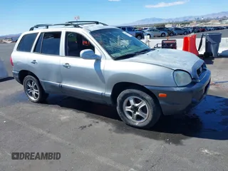 2004 Hyundai Santa Fe GLS with VIN KM8SC13E74U711329, listed as a IAAI auction lot 41814704 with 1 mi miles. Bid and sale history available at carsss.com. Image 1.