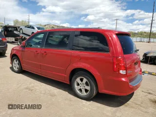 2012 Dodge Grand Caravan SXT with VIN 2C4RDGCG4CR196659, listed as a Copart auction lot 54795505 with 138,576 mi miles and Clean Title. Bid and sale history available at DreamBid. Image 2.