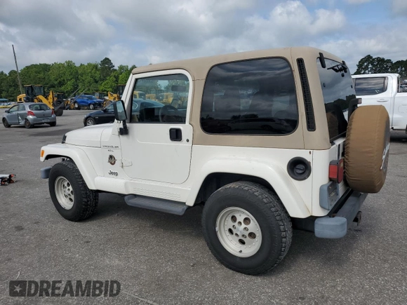 1999 Jeep Wrangler Sahara z VIN 1J4FY49S0XP432968, wystawiony jako Copart lot #65033715 z przebiegiem 126 420 mil mil oraz Szkoda całkowita • Salvage title. Historia ofert i sprzedaży dostępna na DreamBid. Obrazek 2.