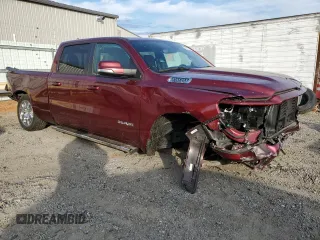 2022 Ram 1500 Big Horn with VIN 1C6SRFMT3NN265986, listed as a Copart auction lot 83177674 with 27,077 mi miles and Salvage title. Bid and sale history available at DreamBid. Image 4.