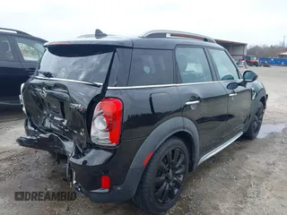 2017 MINI Countryman Cooper S with VIN WMZYT3C34H3D98585, listed as a IAAI auction lot 41752740 with 58,381 mi miles. Bid and sale history available at carsss.com. Image 4.