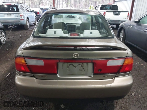 1998 Mazda Protege DX with VIN JM1BC141XW0200689, listed as a IAAI auction lot 41540162 with 172,311 mi miles and . Bid and sale history available at DreamBid. Image 16.