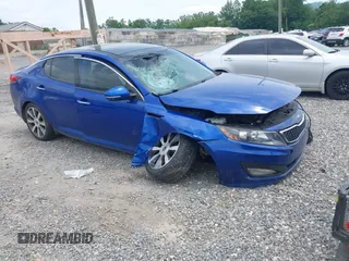 2013 Kia Optima SX z VIN 5XXGR4A63DG137405, wystawiony jako IAAI lot #42320004 z przebiegiem 132 150 mil mil oraz . Historia ofert i sprzedaży dostępna na DreamBid. Obrazek 1.