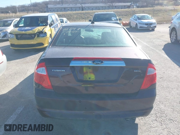 2012 Ford Fusion SEL z VIN 3FAHP0JA7CR302871, wystawiony jako IAAI lot #41694603 z przebiegiem 104 104 mil mil oraz . Historia ofert i sprzedaży dostępna na DreamBid. Obrazek 16.