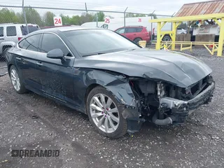 2018 Audi A5 Sportback Premium z VIN WAUANCF59JA007791, wystawiony jako IAAI lot #42221730 z przebiegiem 68 350 mil mil oraz . Historia ofert i sprzedaży dostępna na DreamBid. Obrazek 1.