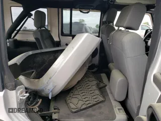 2007 Jeep Wrangler Unlimited Sahara с VIN 1J4GA591X7L158014, выставлен на аукционе Copart как лот 55201105 с пробегом 162 797 миль миль и Списание • Salvage title. История ставок и продаж доступна на DreamBid. Изображение 10.