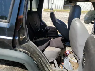 1998 Jeep Cherokee Sport with VIN 1J4FT68S9WL141631, listed as a Copart auction lot 68974974 with 0 mi miles and Salvage Title. Bid and sale history available at carsss.com. Image 12.
