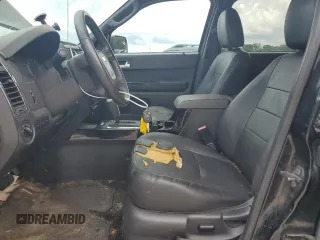 2010 Ford Escape Limited with VIN 1FMCU0E73AKD37125, listed as a Copart auction lot 59763495 with 203,823 mi miles and Salvage title. Bid and sale history available at DreamBid. Image 7.