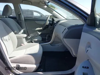 2009 Toyota Corolla with VIN 1NXBU40E99Z108425, listed as a IAAI auction lot 39553892 with 208,165 mi miles and . Bid and sale history available at DreamBid. Image 5.