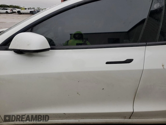 2023 Tesla Model 3 with VIN 5YJ3E1EA9PF510588, listed as a Copart auction lot 51860125 with Not provided miles and Clean title. Bid and sale history available at DreamBid. Image 7.