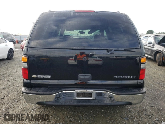 2004 Chevrolet Tahoe LS with VIN 1GNEC13V24R305650, listed as a Copart auction lot 44187625 with 82,000 mi miles and Salvage Title. Bid and sale history available at carsss.com. Image 6.