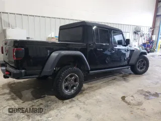 2020 Jeep Gladiator Rubicon with VIN 1C6JJTBG9LL183888, listed as a Copart auction lot 70225794 with 57,969 mi miles and Salvage title. Bid and sale history available at DreamBid. Image 3.