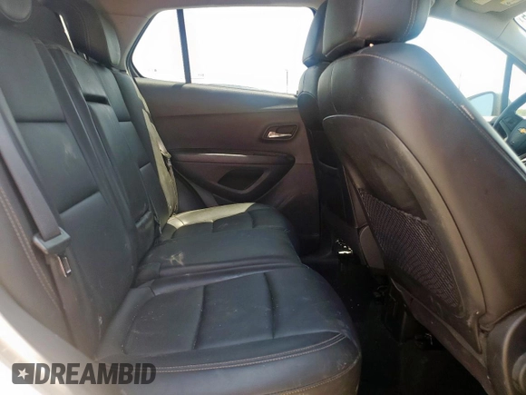 2021 Chevrolet Trax LT с VIN KL7CJPSM5MB372699, выставлен на аукционе Copart как лот 57873255 с пробегом 77 361 миль миль и Списание • Salvage title. История ставок и продаж доступна на DreamBid. Изображение 11.